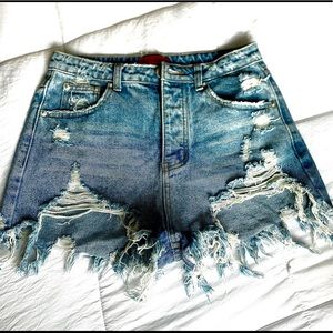 Ripped Blue Jean style shorts